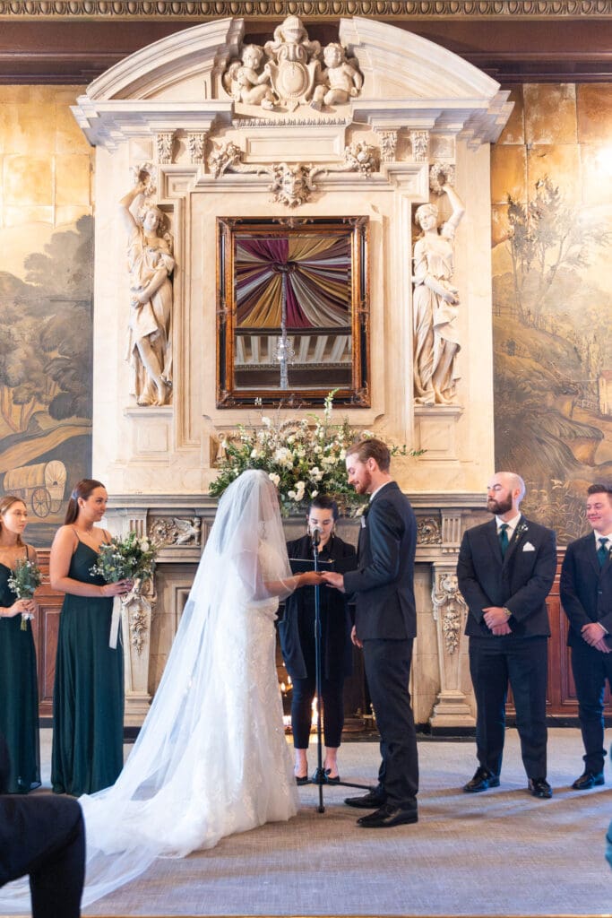 bride and groom holding hands