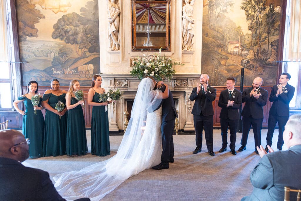 bride and groom hugging
