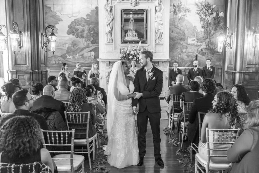 bride and groom holding each other