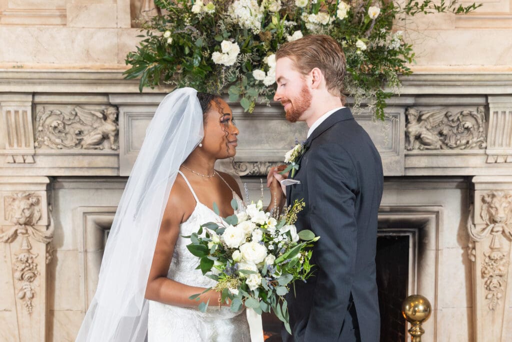 bride and groom looking at each other