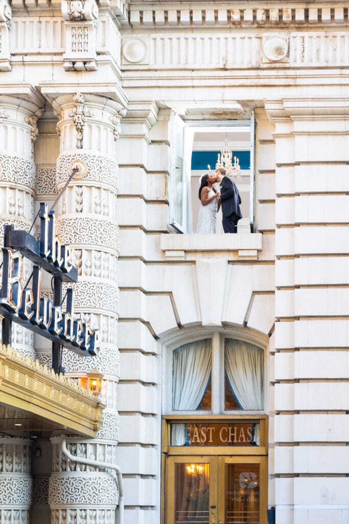 famous belvedere window shot bride and groom
