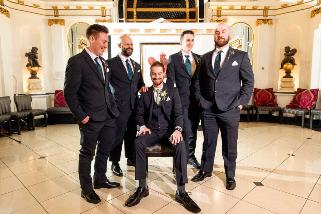 Groomsmen laughing before ceremony
