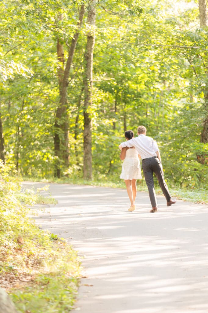 Shenandoah National Park couple walking arm around her