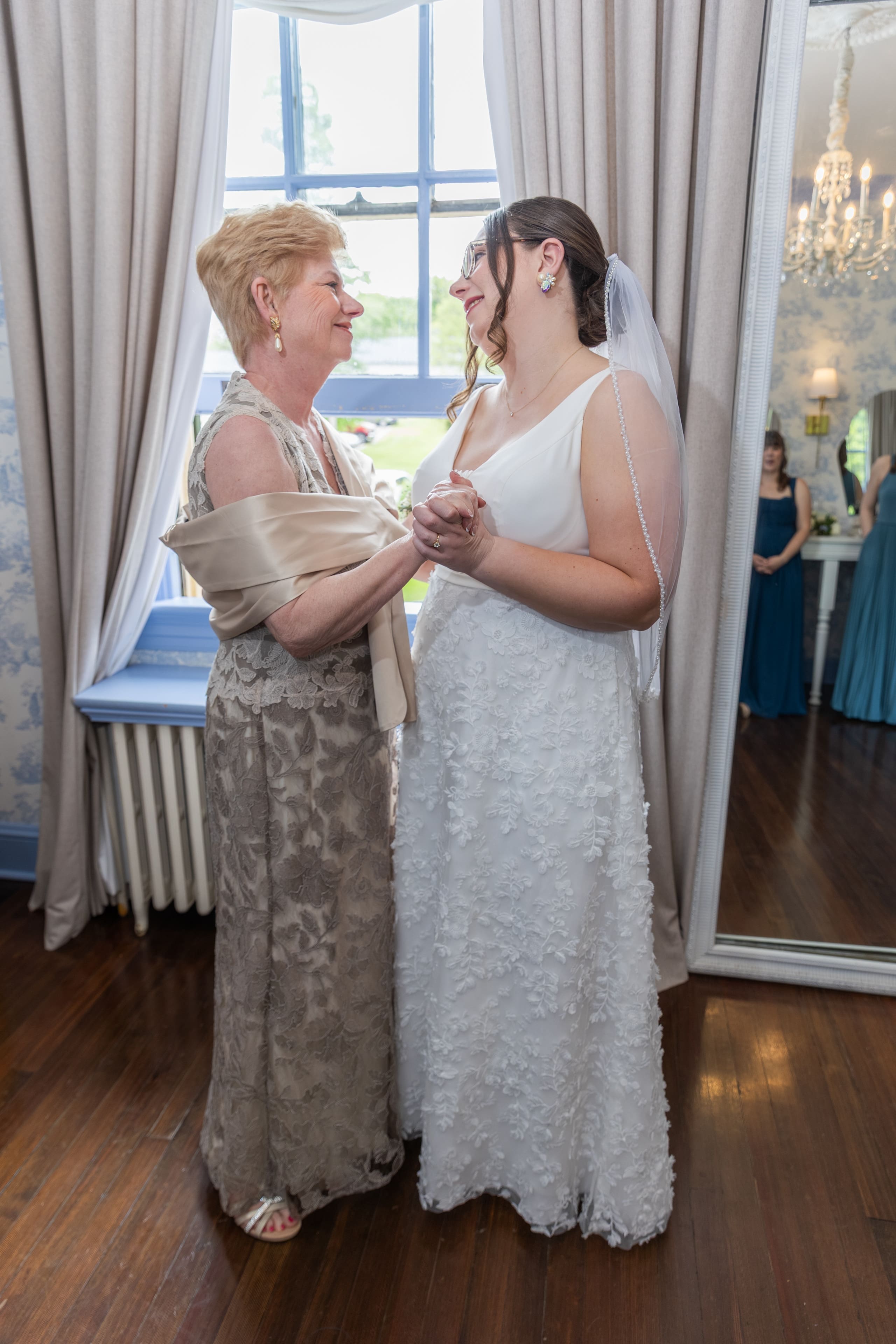 mother bride smiling before ceremony