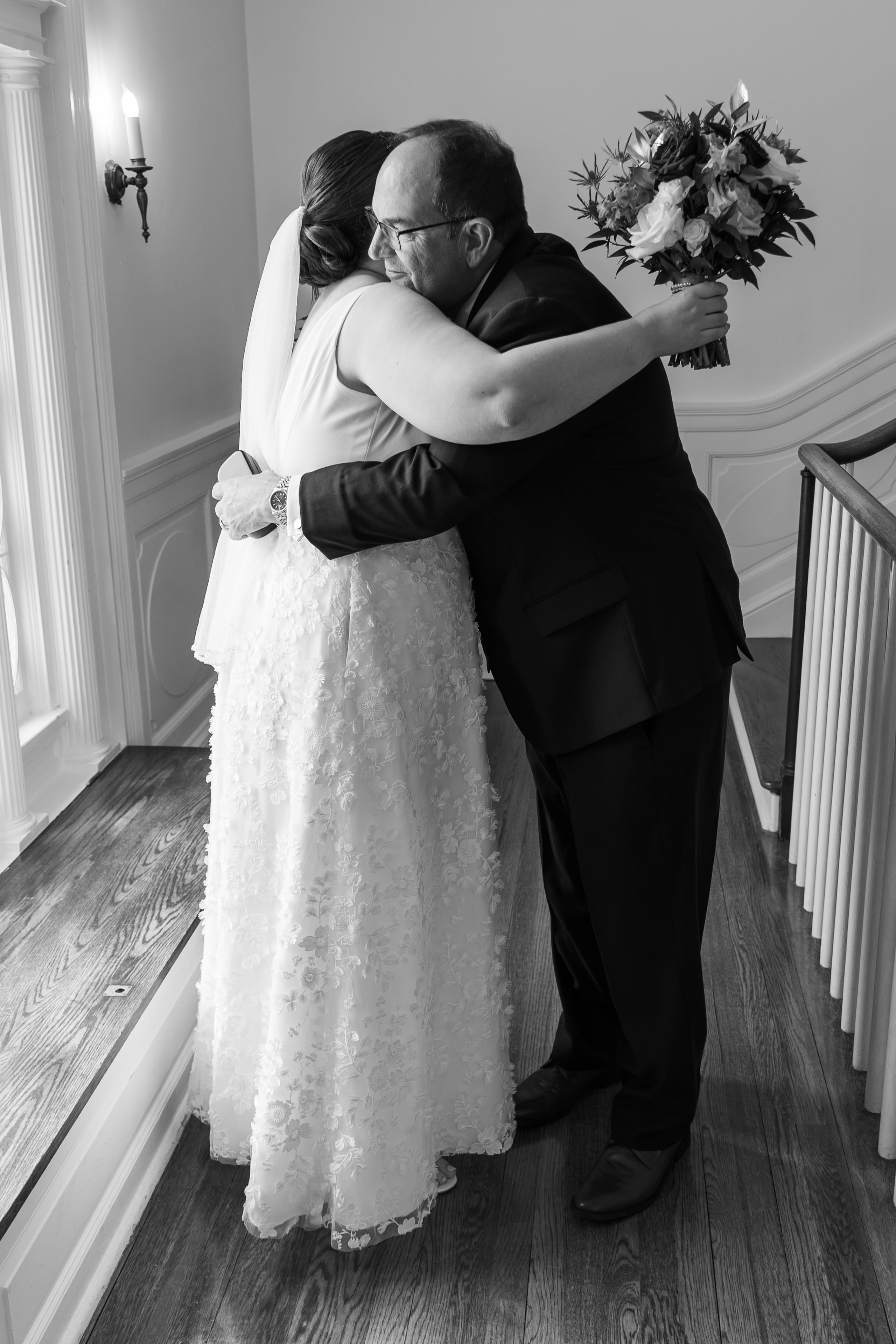 bride father hugging before ceremony